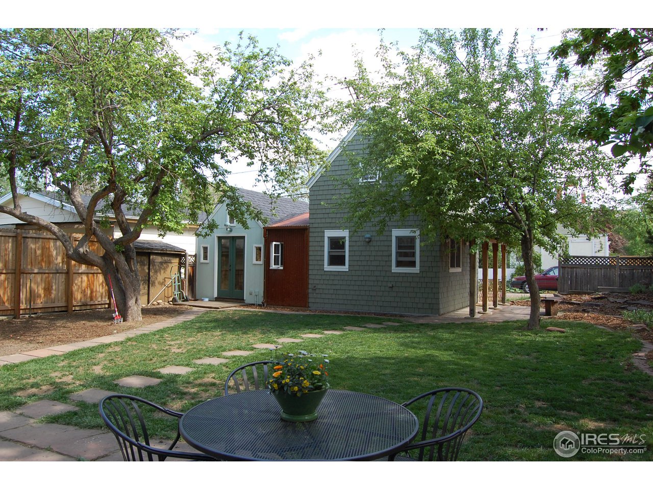 2012 Mapleton Avenue Boulder, CO 80304 - Photo 8 of 14 a view of a yard in front of a house with a large tree
