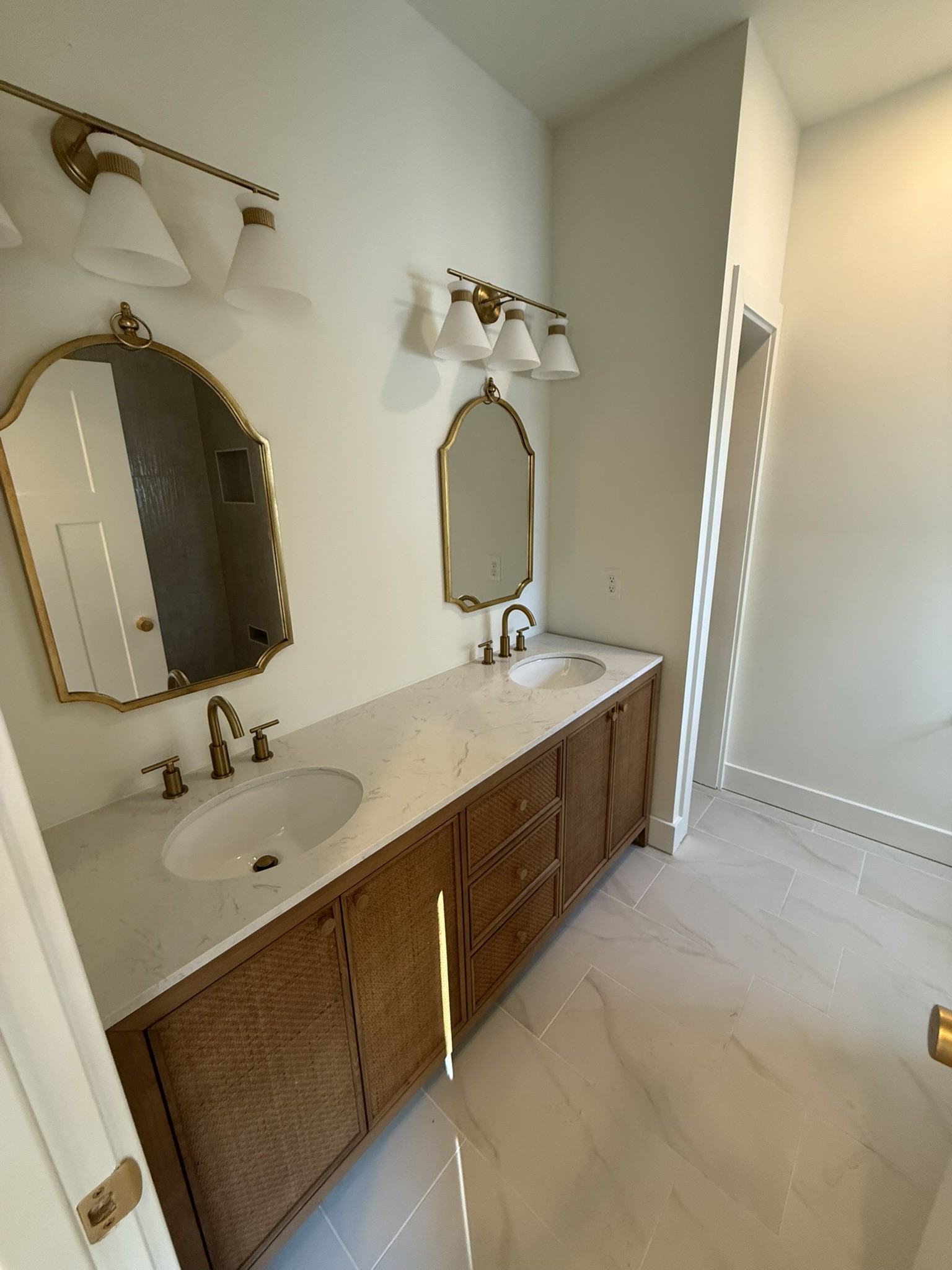 910 East 17th Avenue Springfield, TN 37172 - Photo 10 of 17 a bathroom with a double vanity sink and mirror