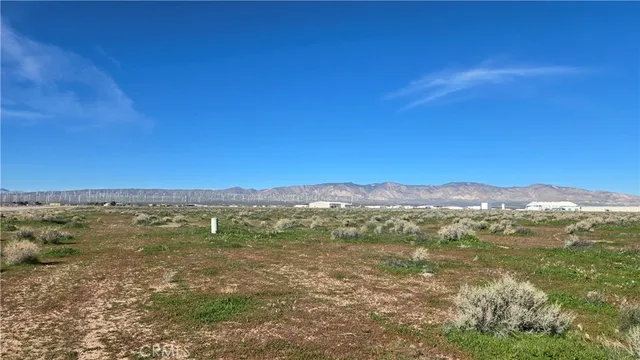 a view of an outdoor space with mountain view