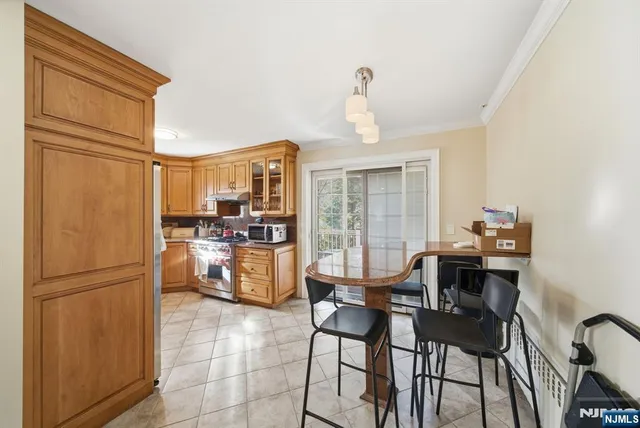 an aerial view of a houses with yard