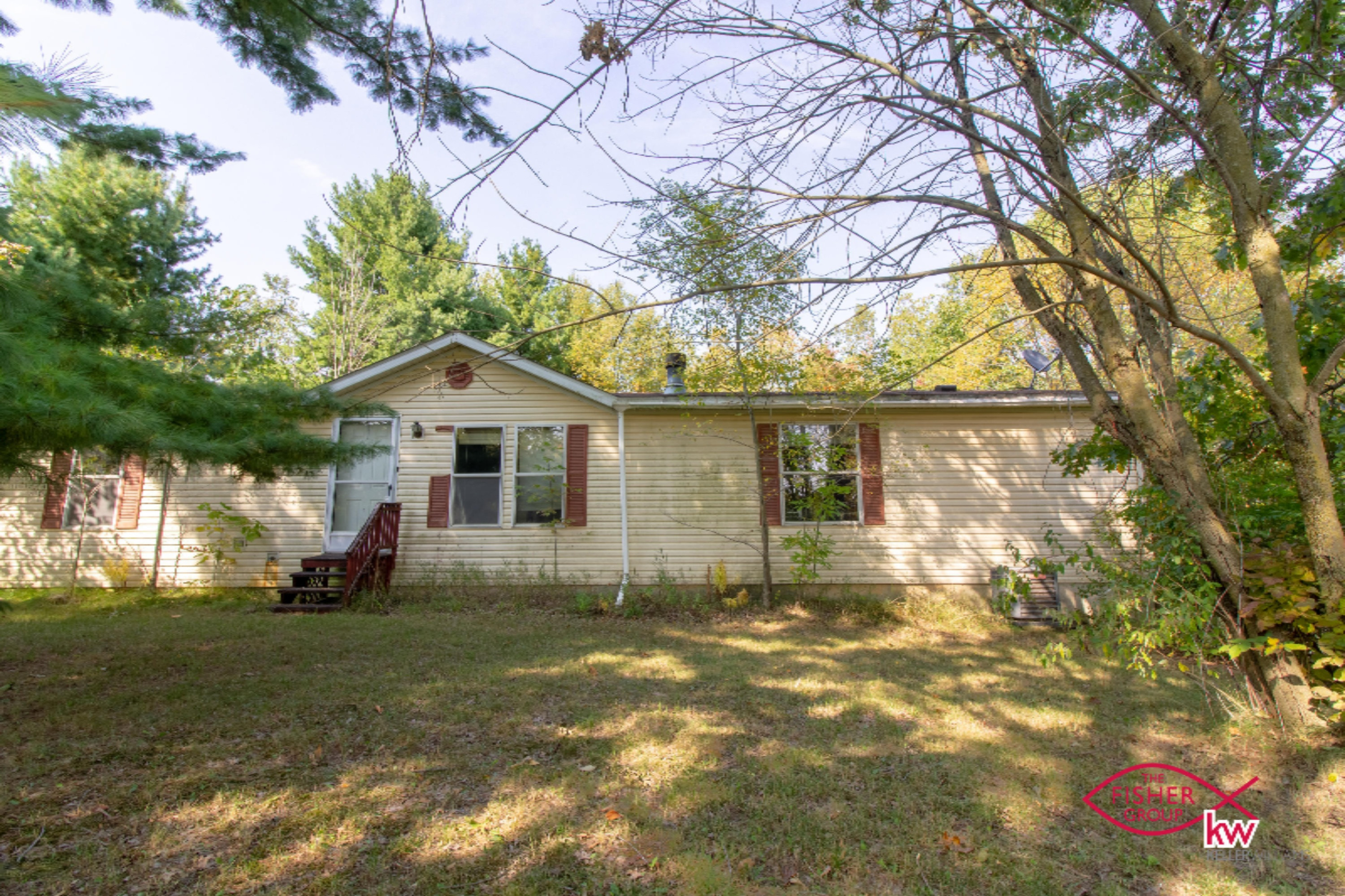 9104 Peck Lake Road Lowell, MI 49331 - Photo 1 of 31 Front of House