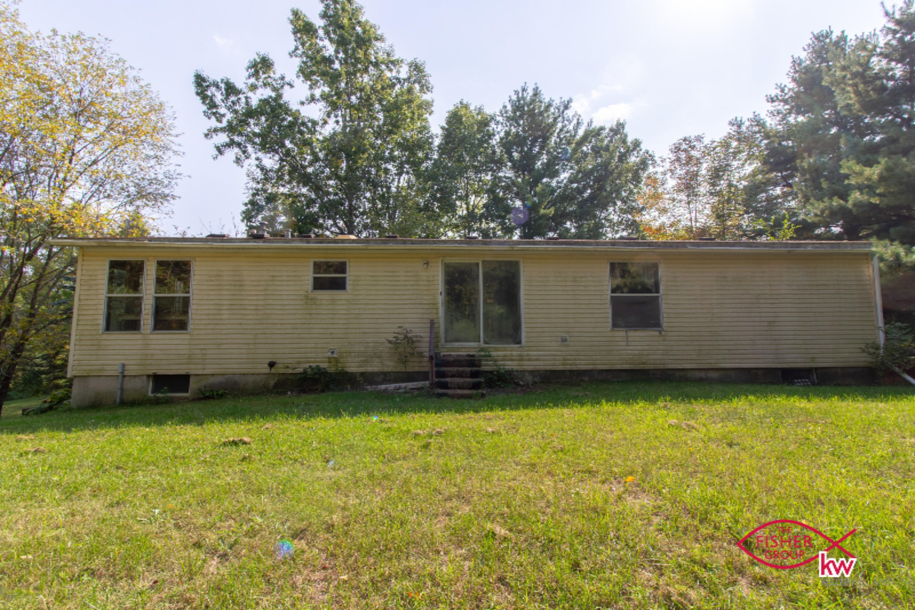 9104 Peck Lake Road Lowell, MI 49331 - Photo 20 of 31 Back of house slider