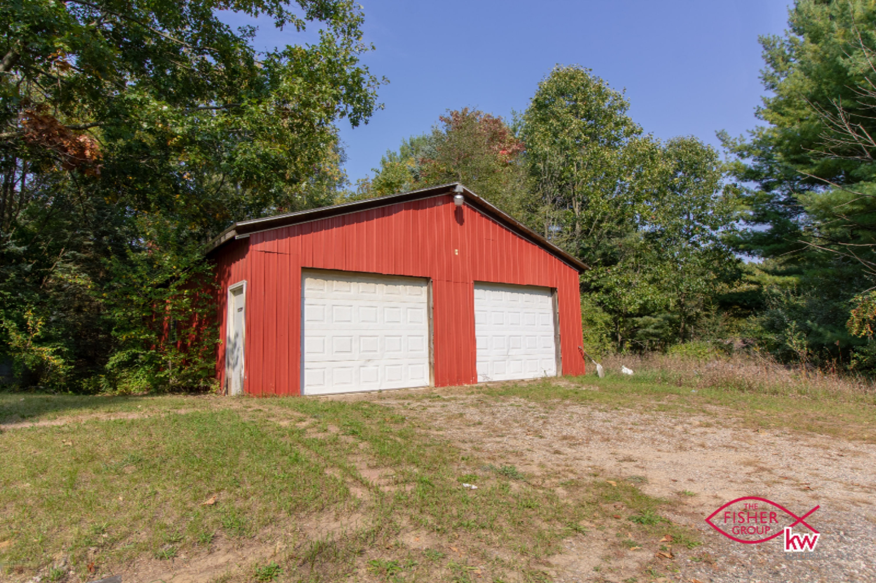 9104 Peck Lake Road Lowell, MI 49331 - Photo 24 of 31 Pole Barn with side door