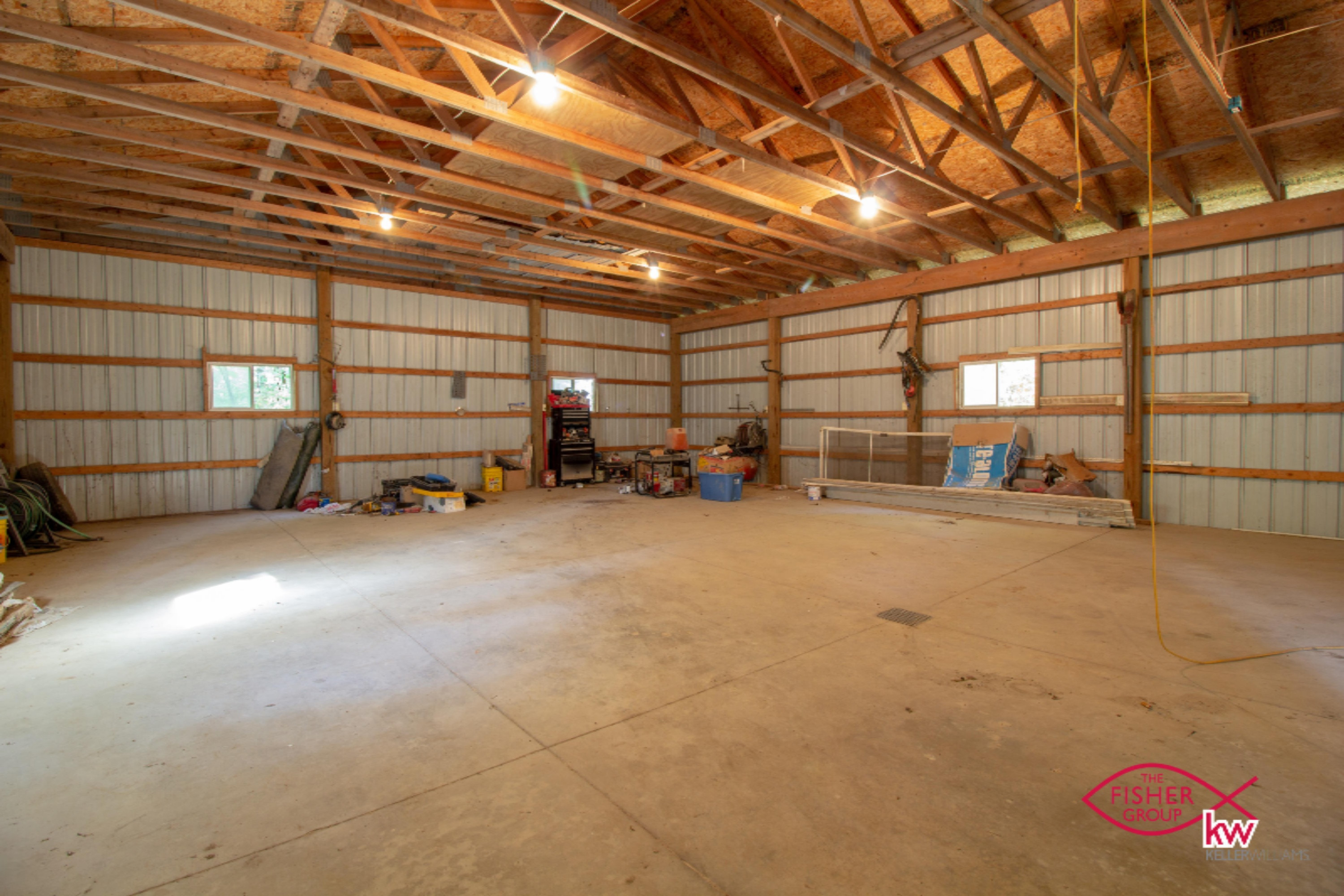 9104 Peck Lake Road Lowell, MI 49331 - Photo 26 of 31 Pole barn interior 1