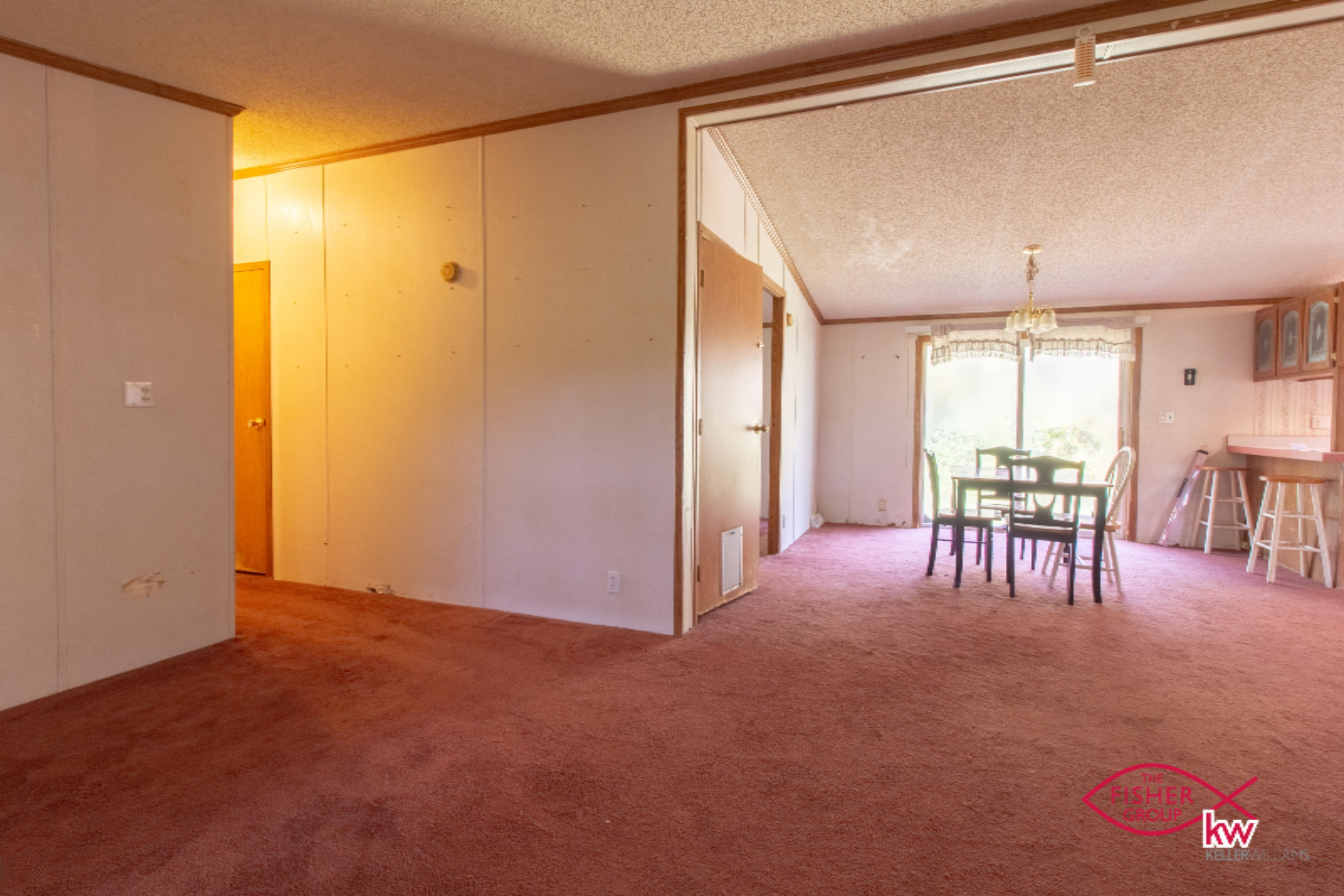 9104 Peck Lake Road Lowell, MI 49331 - Photo 4 of 31 Living room to dining room