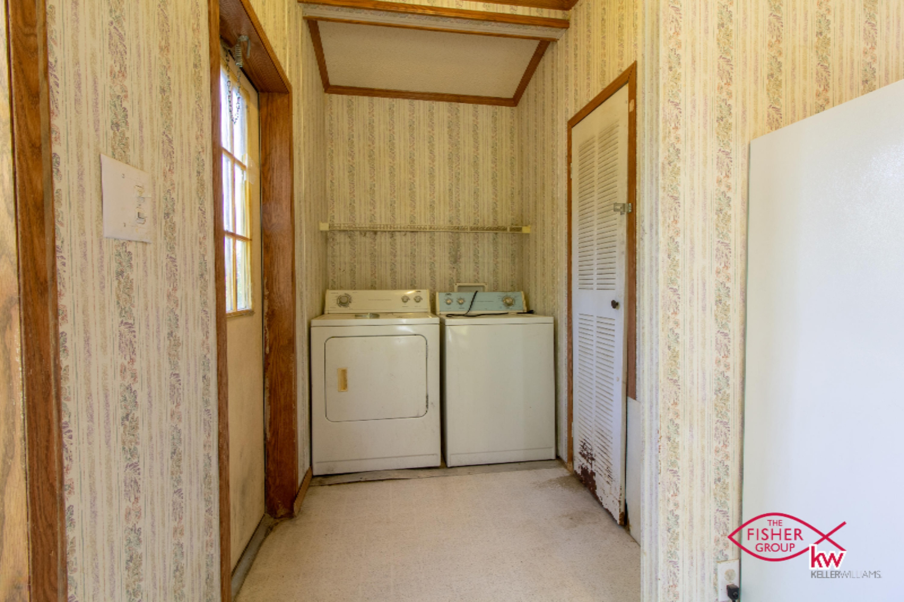 9104 Peck Lake Road Lowell, MI 49331 - Photo 8 of 31 Main floor laundry off kitchen