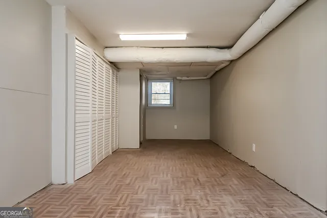 an empty room with windows