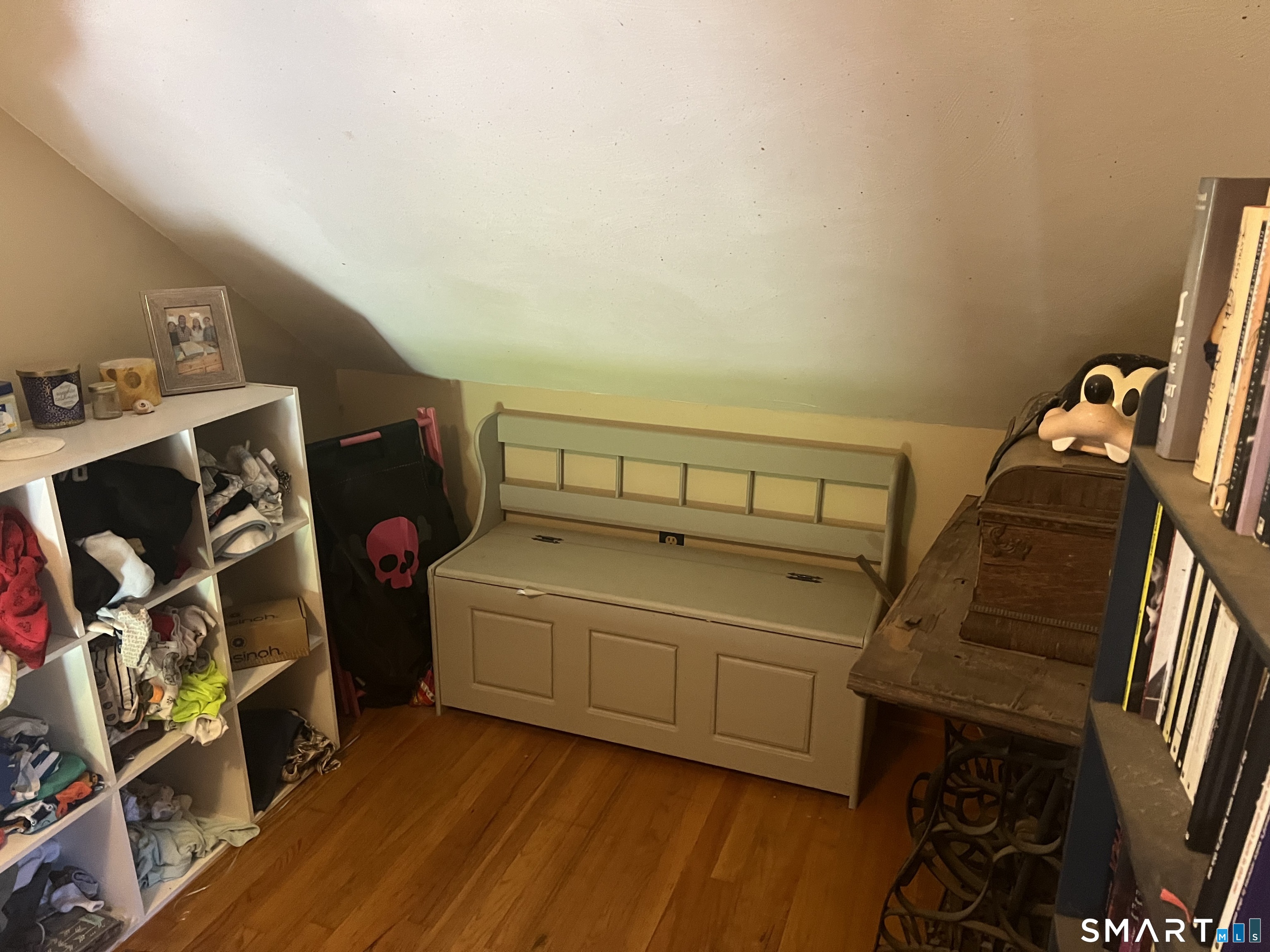 527 Lake Street Manchester, CT 06042 - Photo 15 of 15 a bedroom with a bed and wooden floor