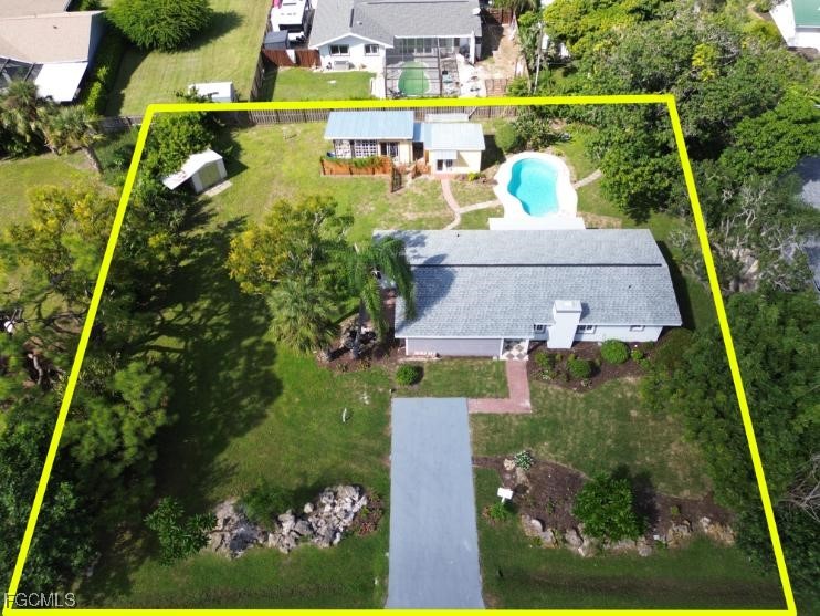 4970 Riverside Drive Estero, FL 33928 - Photo 28 of 35 an aerial view of a house with a garden statue