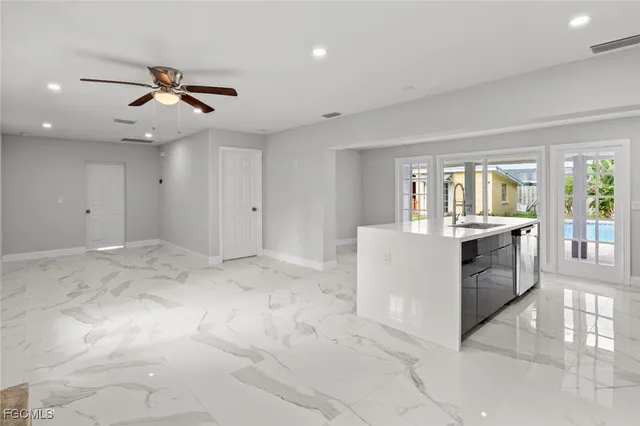 a view of a kitchen with a sink