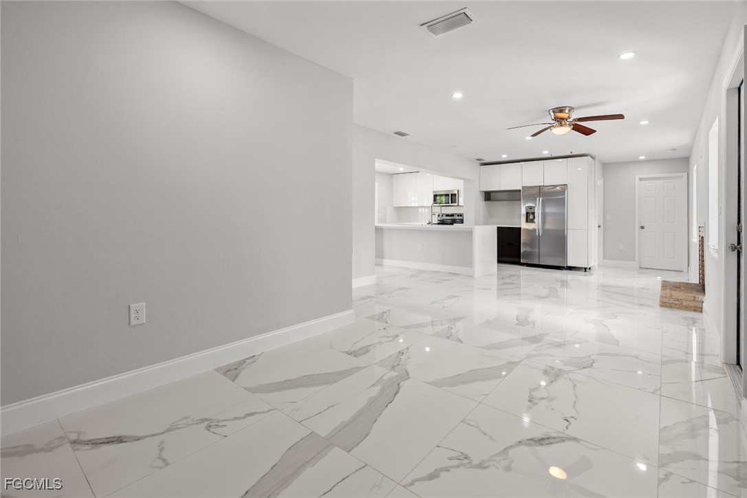 4970 Riverside Drive Estero, FL 33928 - Photo 8 of 35 a view of a kitchen with a sink