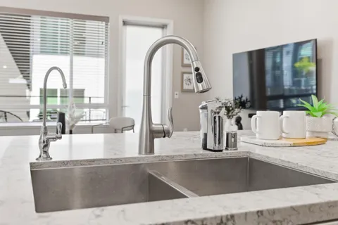a bathroom with a tub and shower