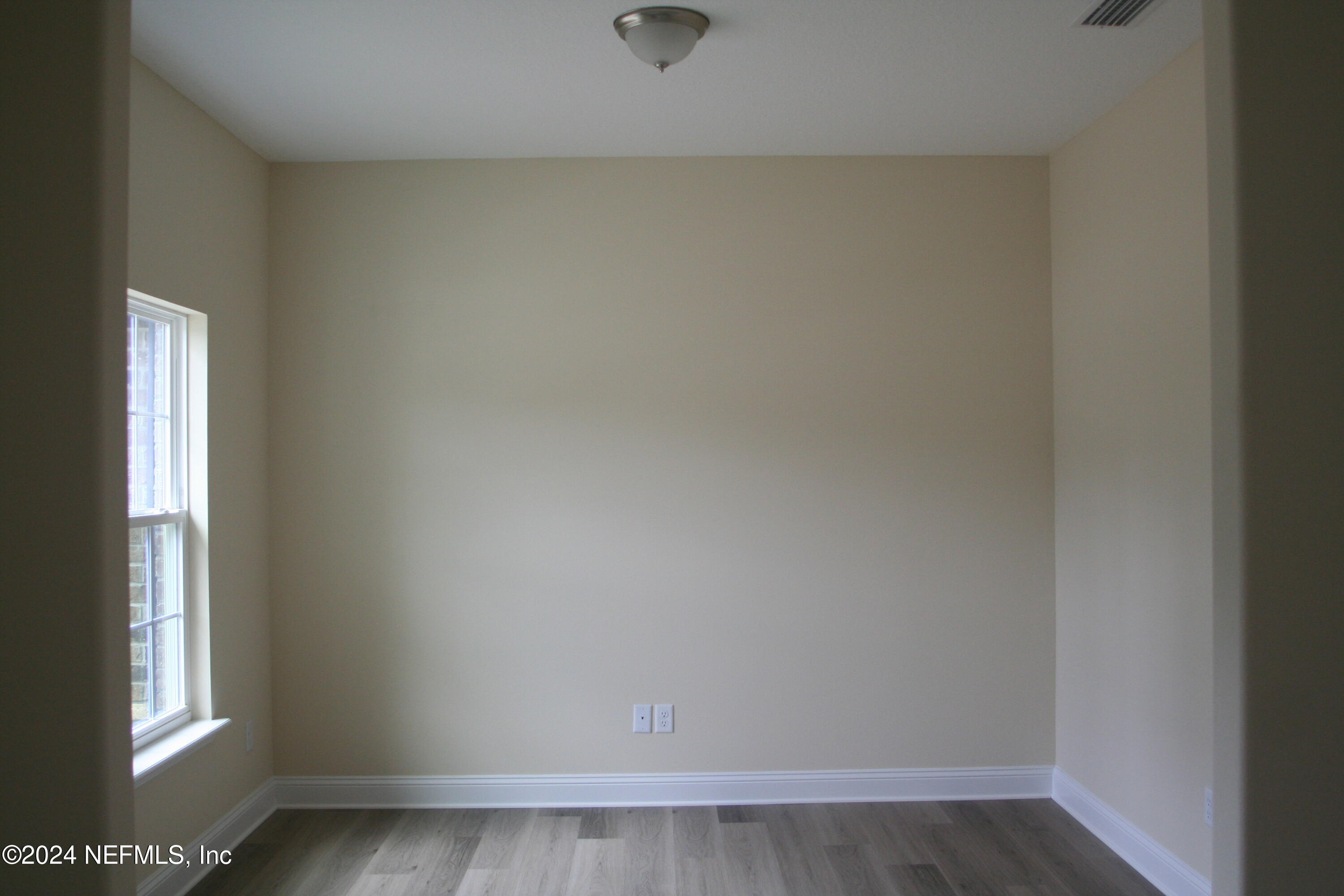 54835 Dornbush Road Callahan, FL 32011 - Photo 3 of 31 a view of an empty room and window