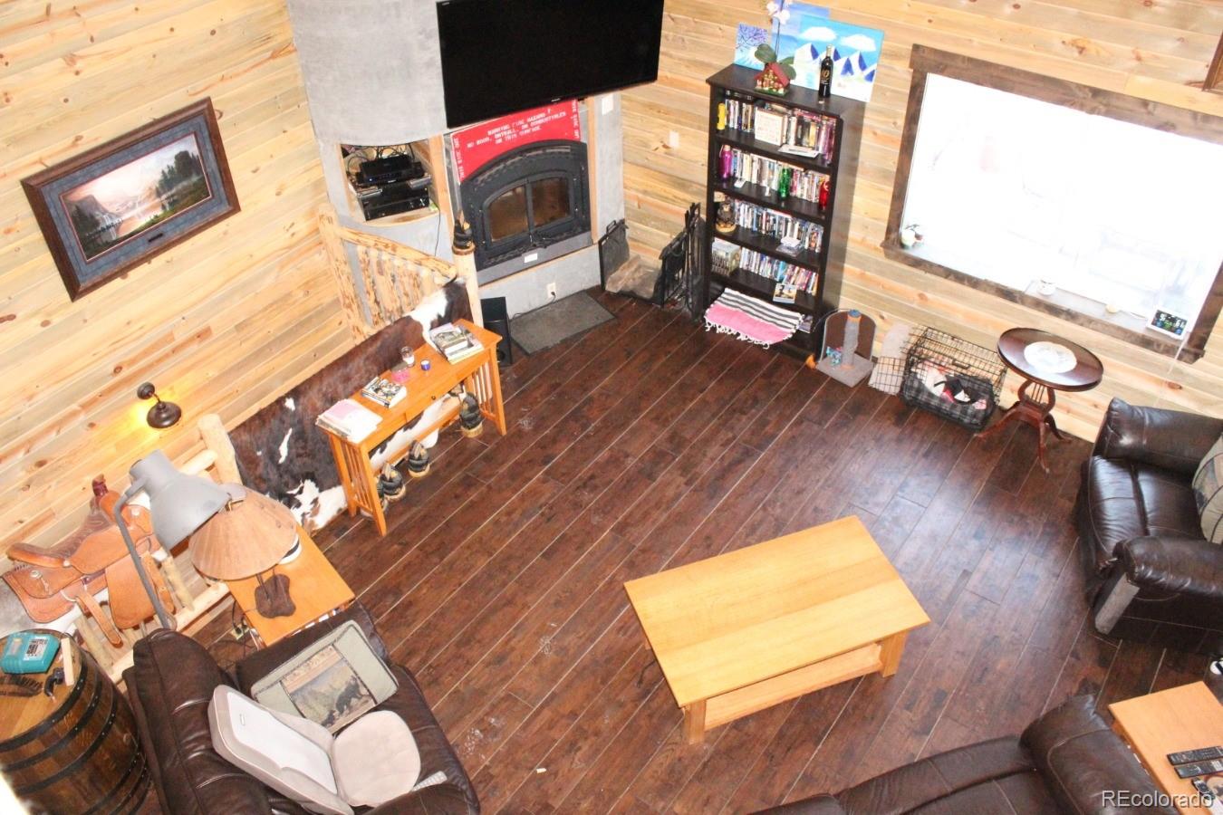 1 Sagamore Trail Black Hawk, CO 80422 - Photo 3 of 34 a view of a living room with a rug and wooden floor