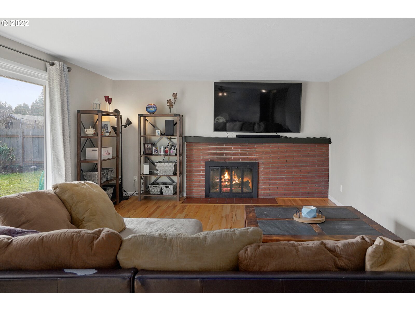 1771 Linwood Street Eugene, OR 97404 - Photo 11 of 22 a living room with furniture and a fireplace