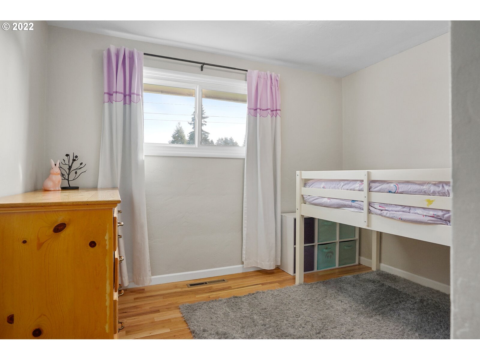 1771 Linwood Street Eugene, OR 97404 - Photo 19 of 22 a bedroom with a bed and a window