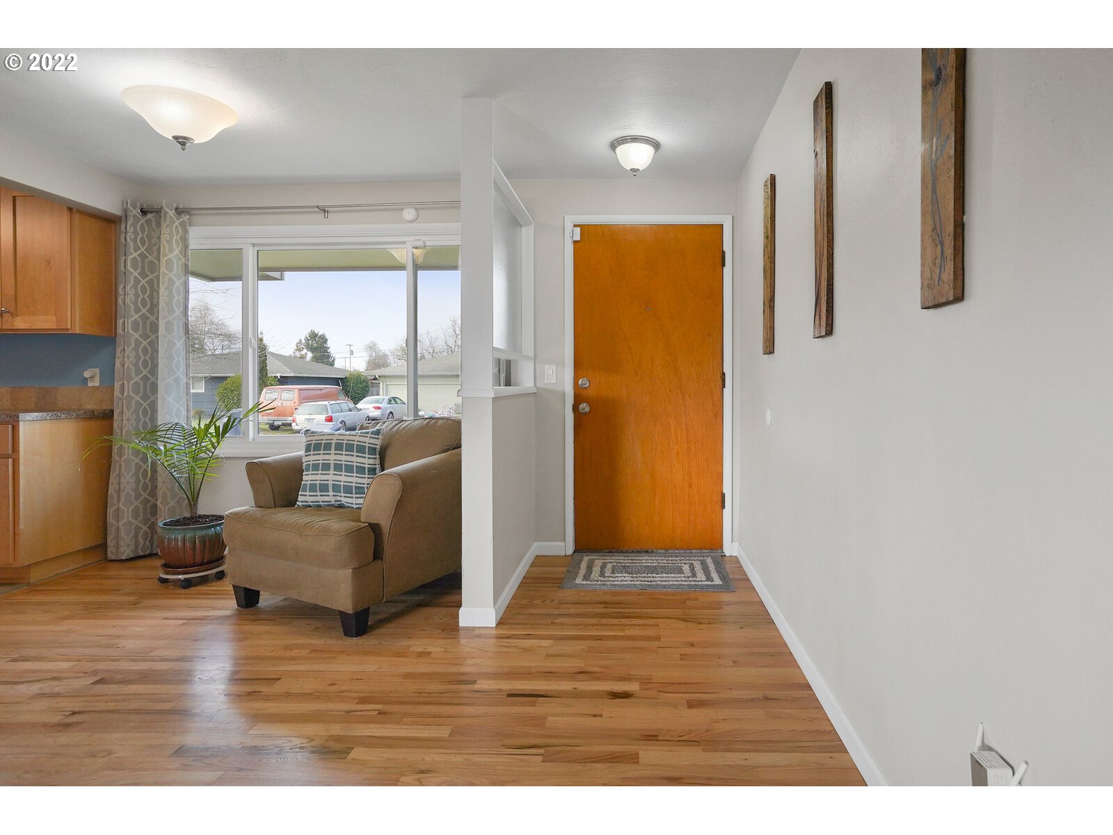 1771 Linwood Street Eugene, OR 97404 - Photo 3 of 22 a living room with furniture and a fireplace