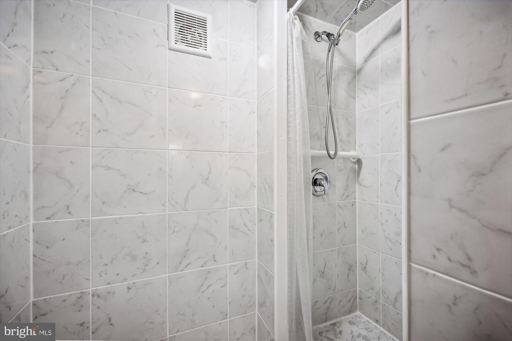 637 Ritchie Avenue Silver Spring, MD 20910 - Photo 11 of 38 a bathroom with a shower