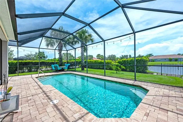 a view of yard with swimming pool