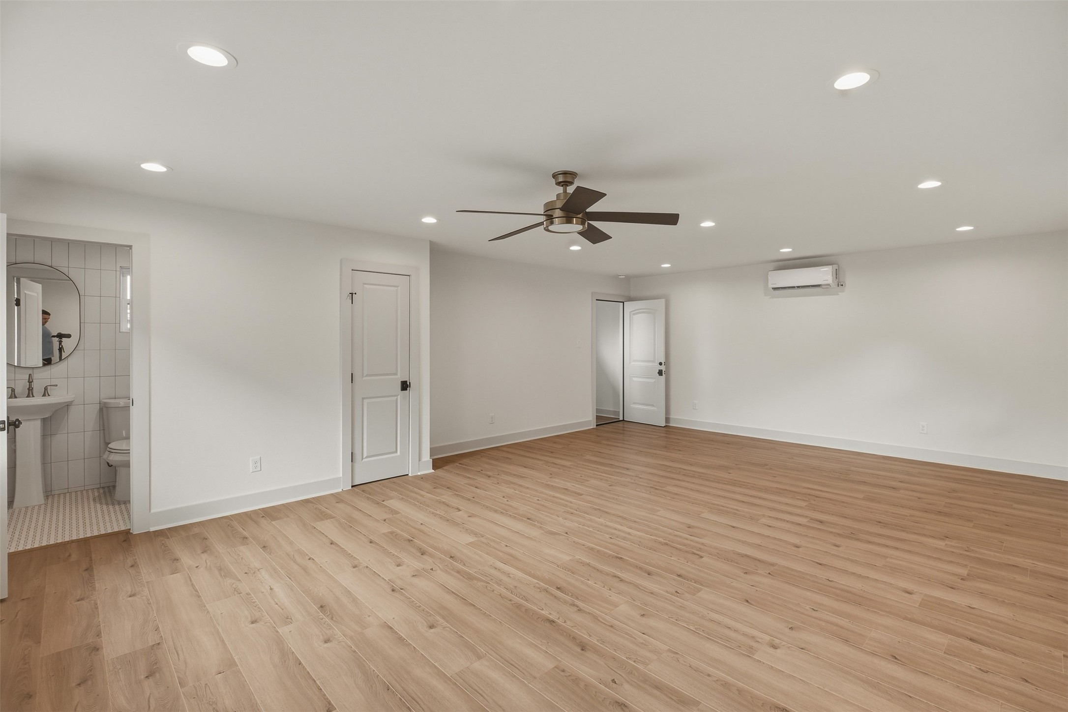1535 Rutland Street Houston, TX 77008 - Photo 45 of 50 a view of an empty room with wooden floor