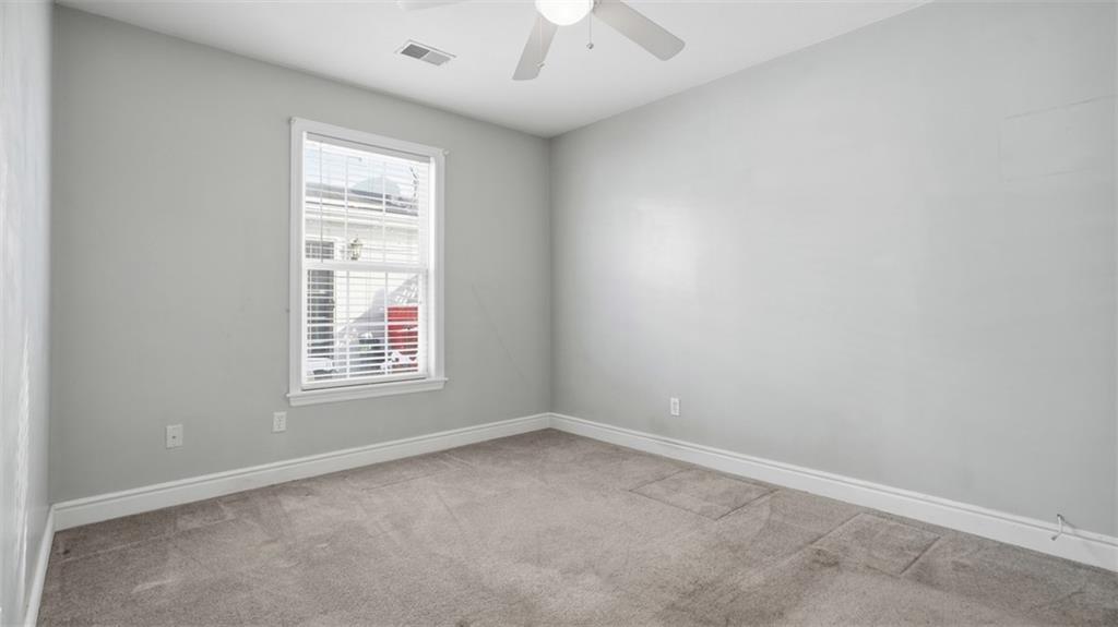 604 Elm Way Coraopolis, PA 15108 - Photo 23 of 30 an empty room with a window and a fan