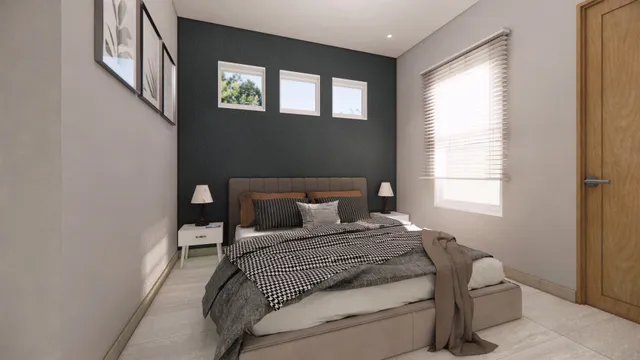 a bedroom with a bed and a window