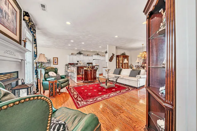 a view of a living room and dining area