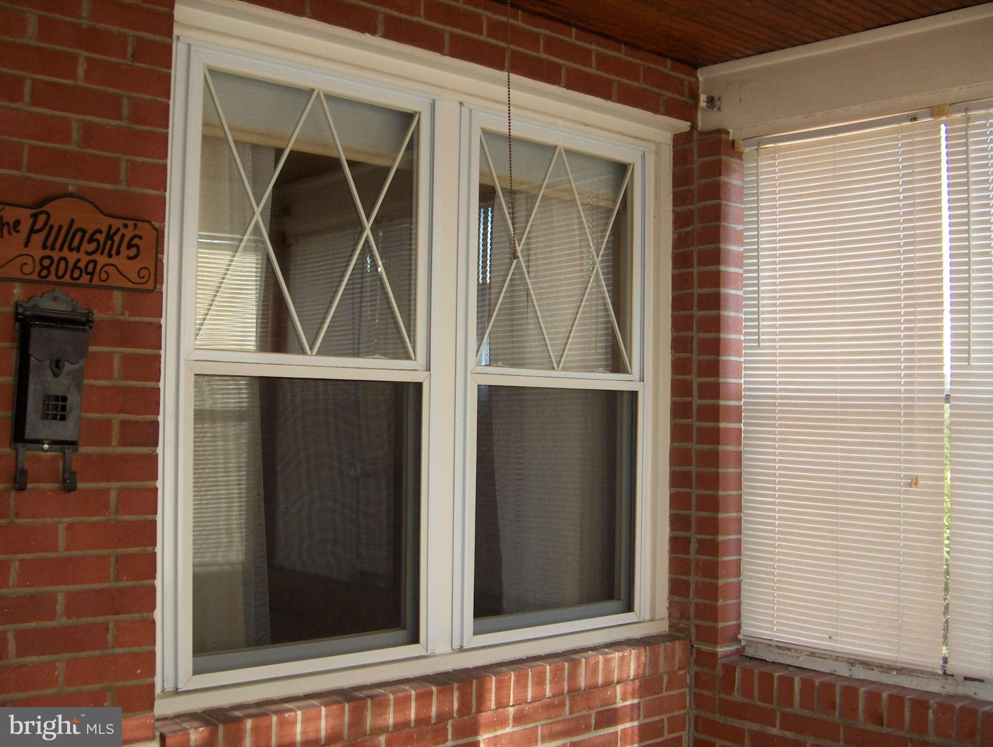 8069 Wallace Road Baltimore, MD 21222 - Photo 20 of 30 Enclosed Front Porch
