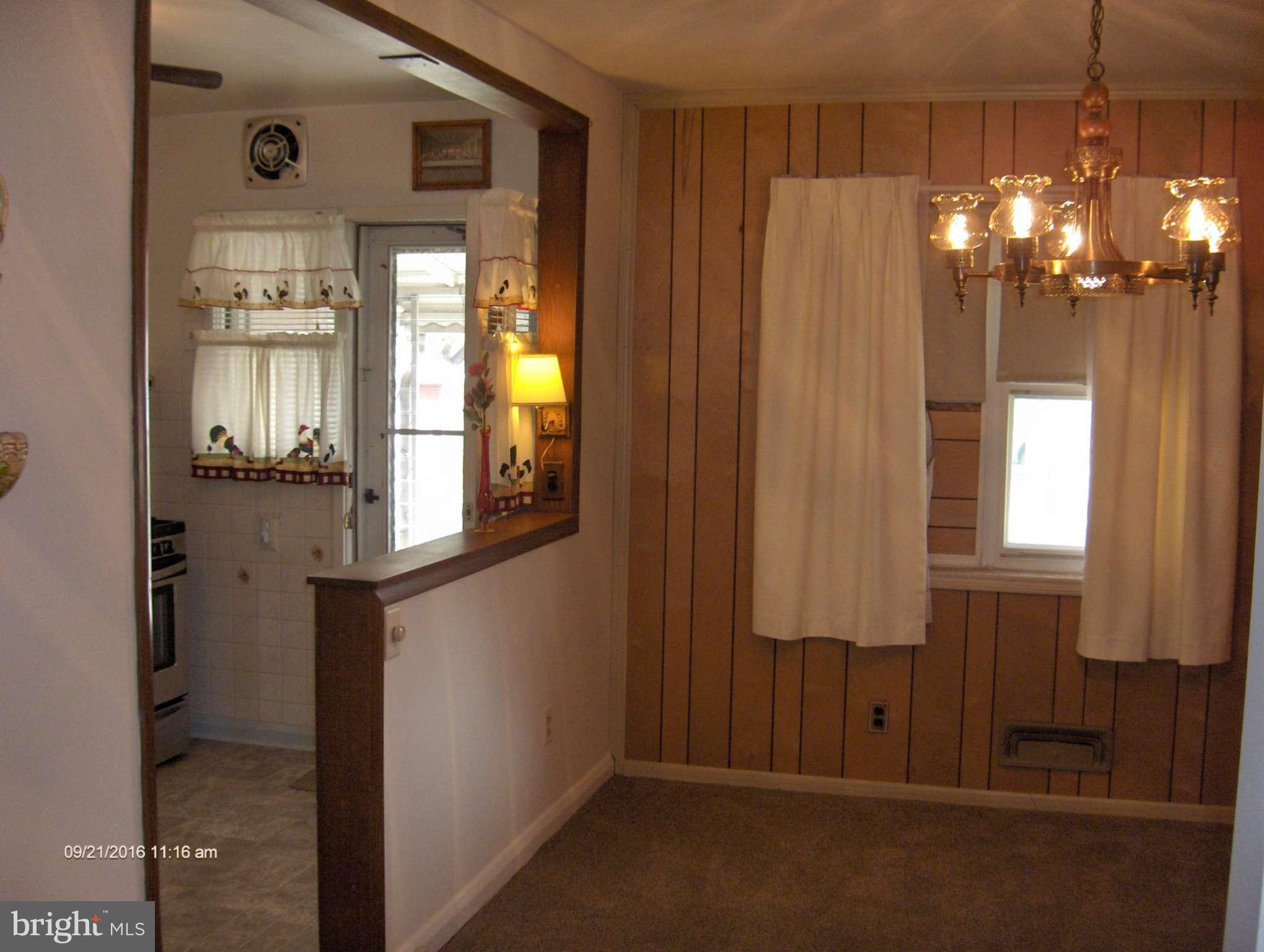 8069 Wallace Road Baltimore, MD 21222 - Photo 6 of 30 and new dining room w/w carpet