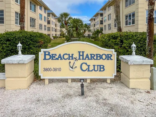 a sign broad in front of a building