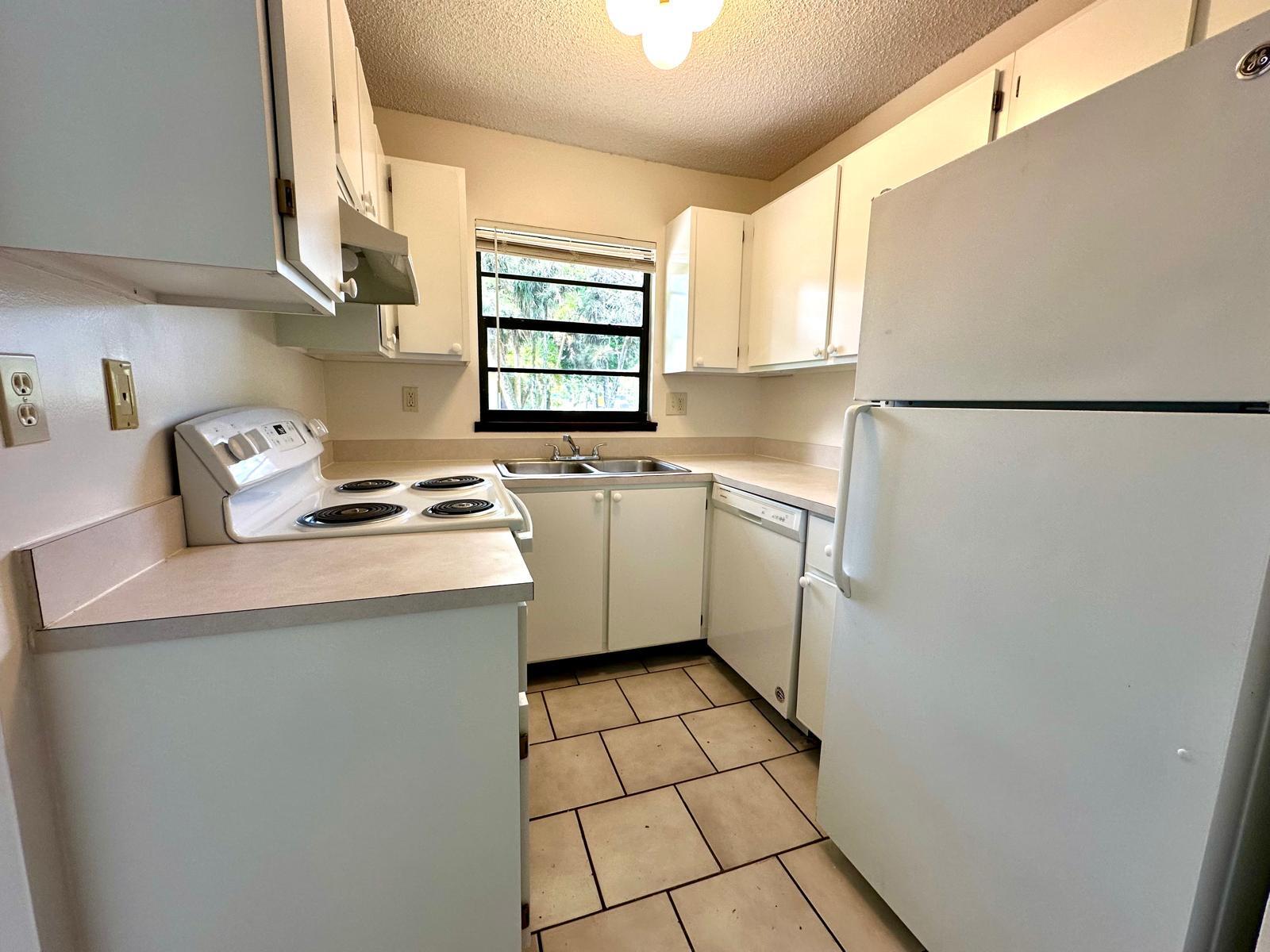 1244 North Haverhill Road, Unit 1 West Palm Beach, FL 33417 - Photo 2 of 16 31e428c9-d894-44e9-8708-8be4c23baa3d