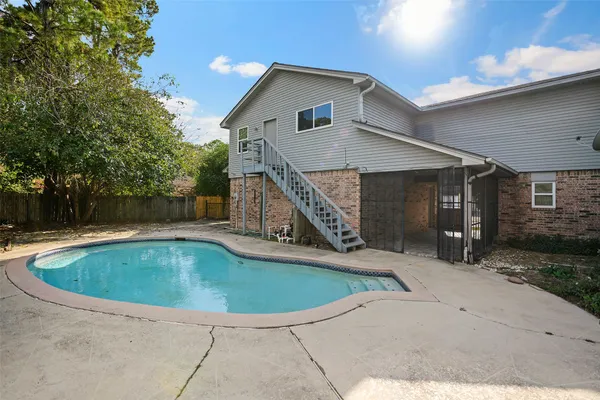 a view of outdoor space yard and swimming pool