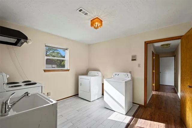 a view of livingroom with washer and dryer