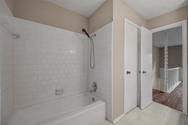 a bathroom with a bathtub