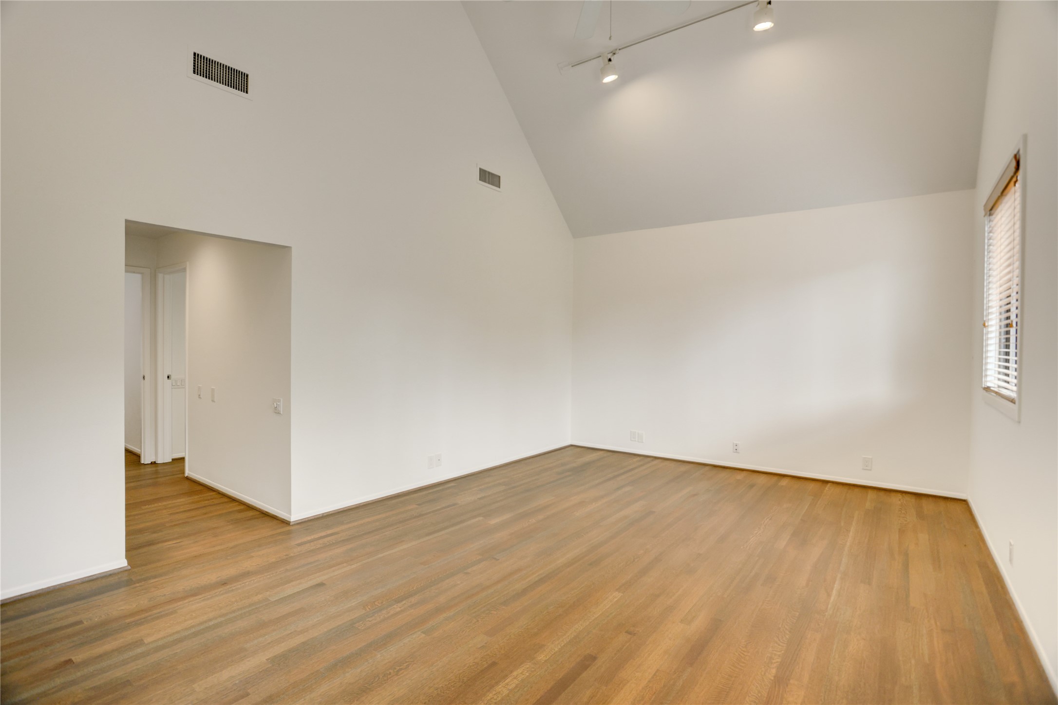 2629 Wroxton Road, Unit A Houston, TX 77005 - Photo 12 of 22 Relax in the primary bedroom, complete with space and tranquility.