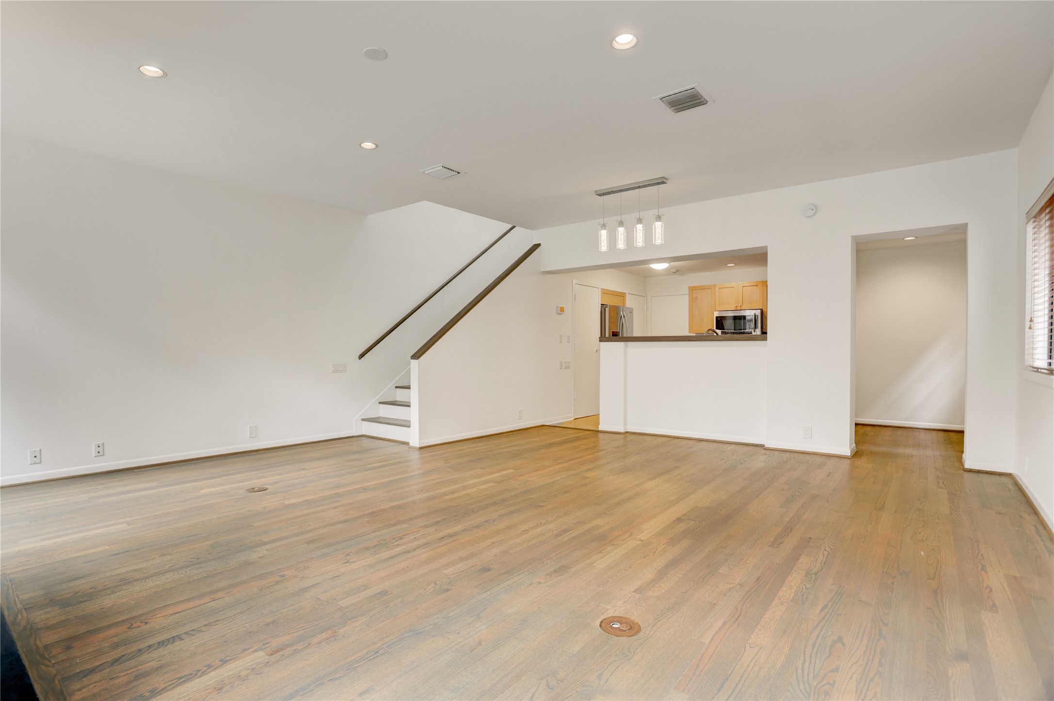 2629 Wroxton Road, Unit A Houston, TX 77005 - Photo 5 of 22 Enjoy the open layout with the stairs and kitchen in view.