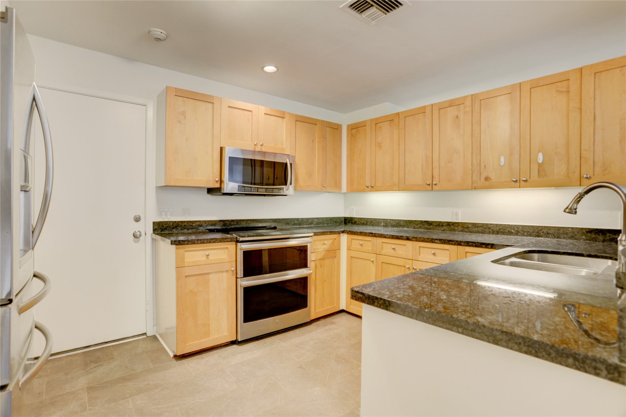 2629 Wroxton Road, Unit A Houston, TX 77005 - Photo 7 of 22 The heart of the home, this kitchen is both stylish and practical.