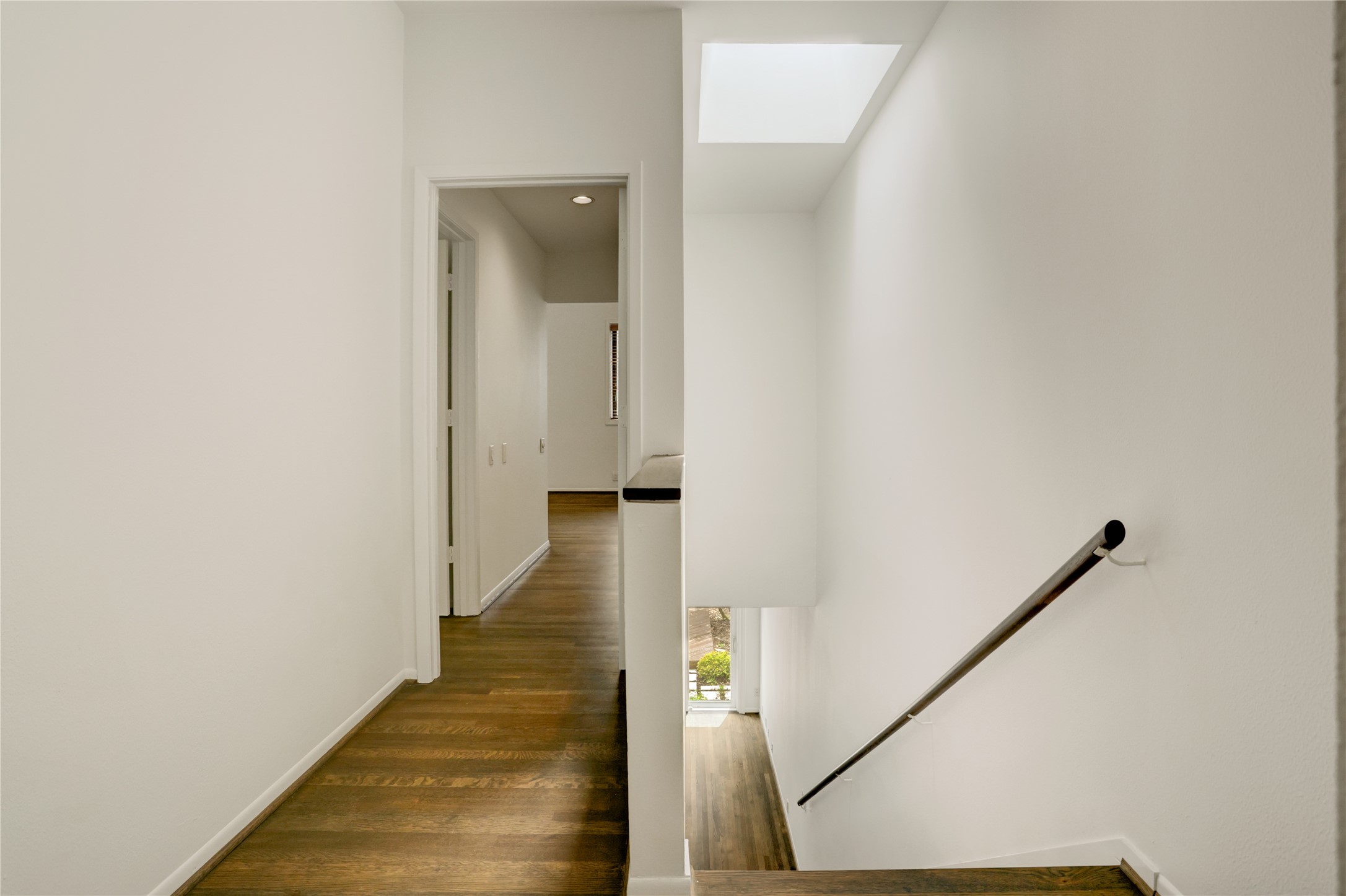 2629 Wroxton Road, Unit A Houston, TX 77005 - Photo 10 of 22 The upstairs hallway offers a seamless flow between rooms.