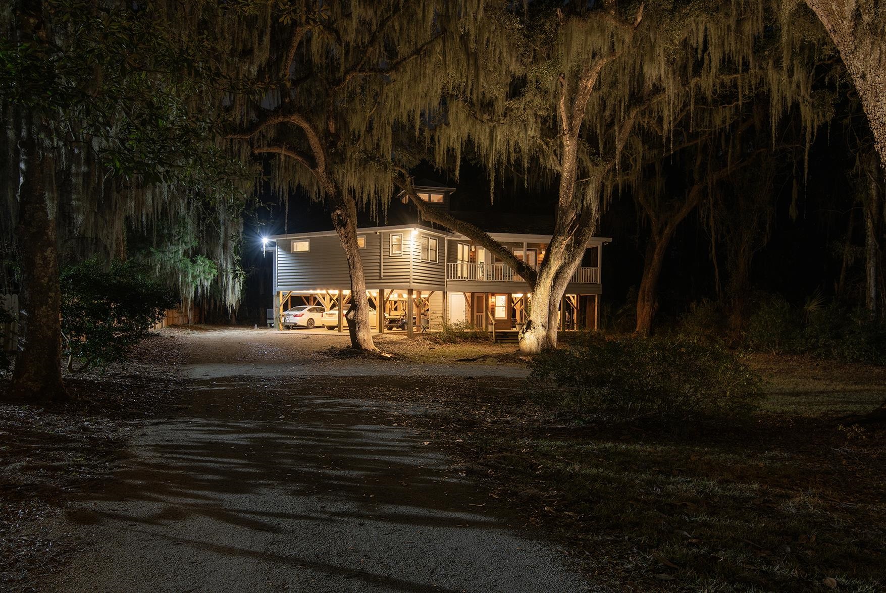 187 Alston Road Pawleys Island, SC 29585 - Photo 9 of 40 View of front of home featuring dirt driveway