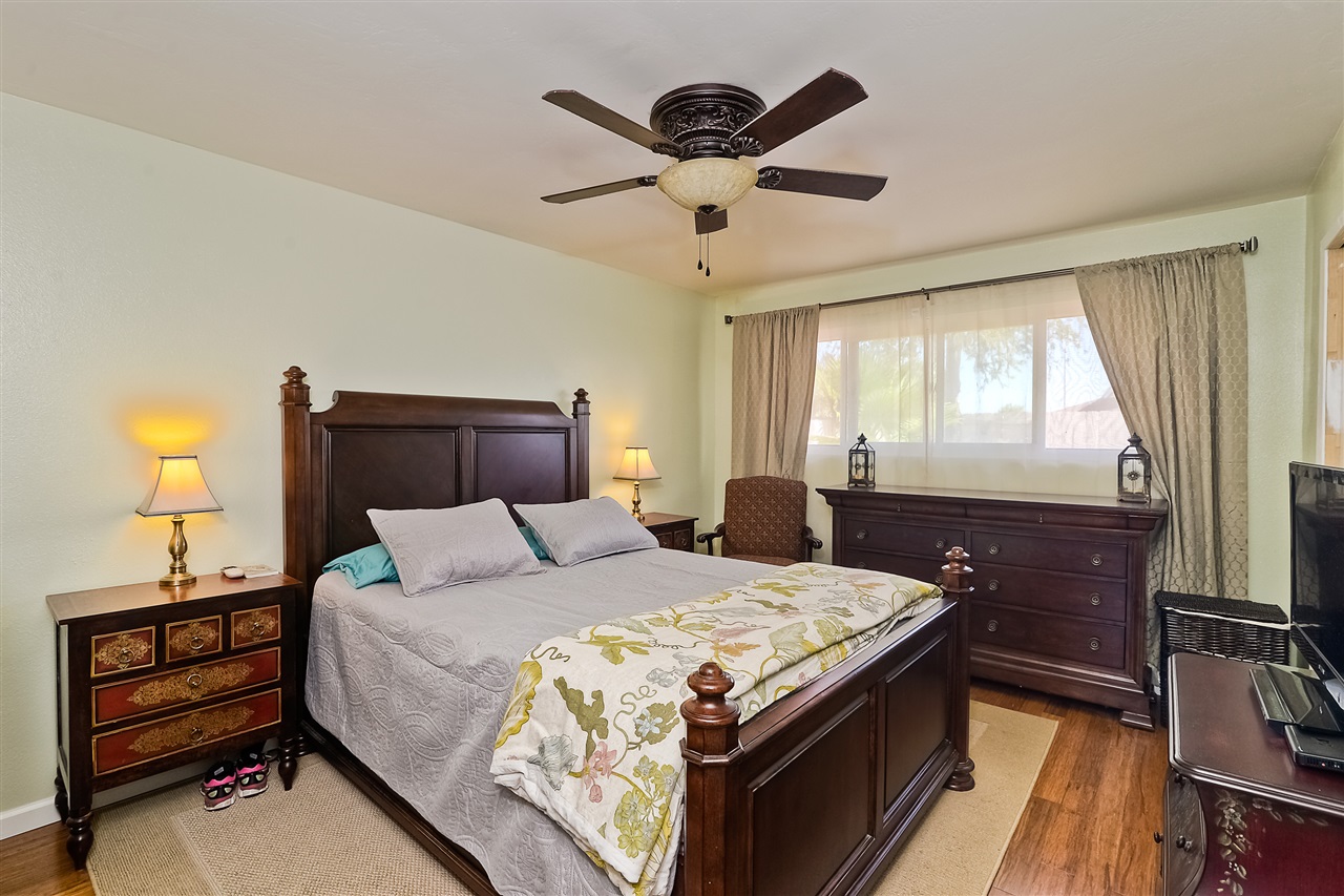 4034 Pala Road Oceanside, CA 92057 - Photo 19 of 22 Master Bedroom with Wood Flooring and Contemporary Ceiling Fan.