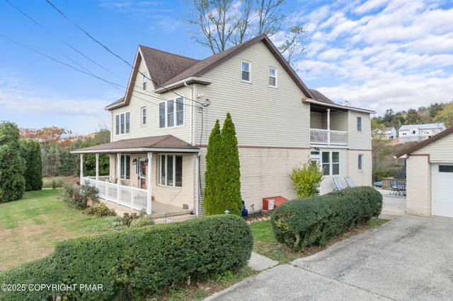 a view of swimming pool with a yard