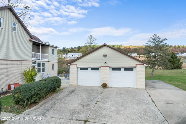 a kitchen with a sink and a fireplace