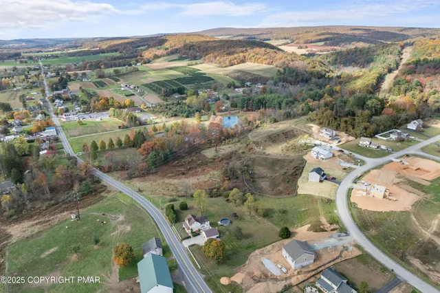 a bathroom with a sink mirror and a bathtub