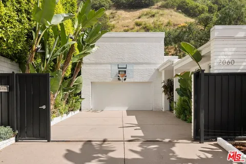 a view of a house with a garage