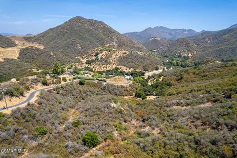 a view of mountains and valleys