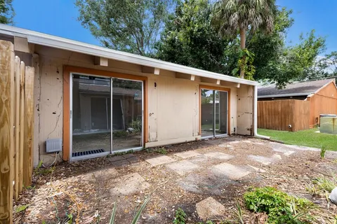 a view of backyard with green space