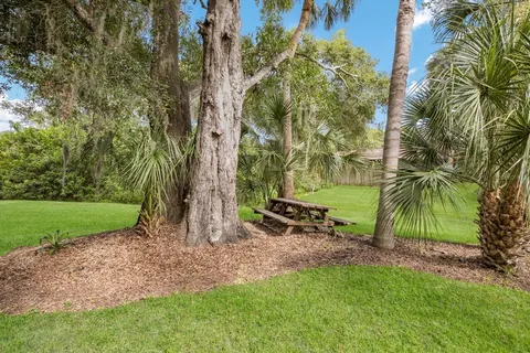 a view of a swimming pool with a lounge chairs