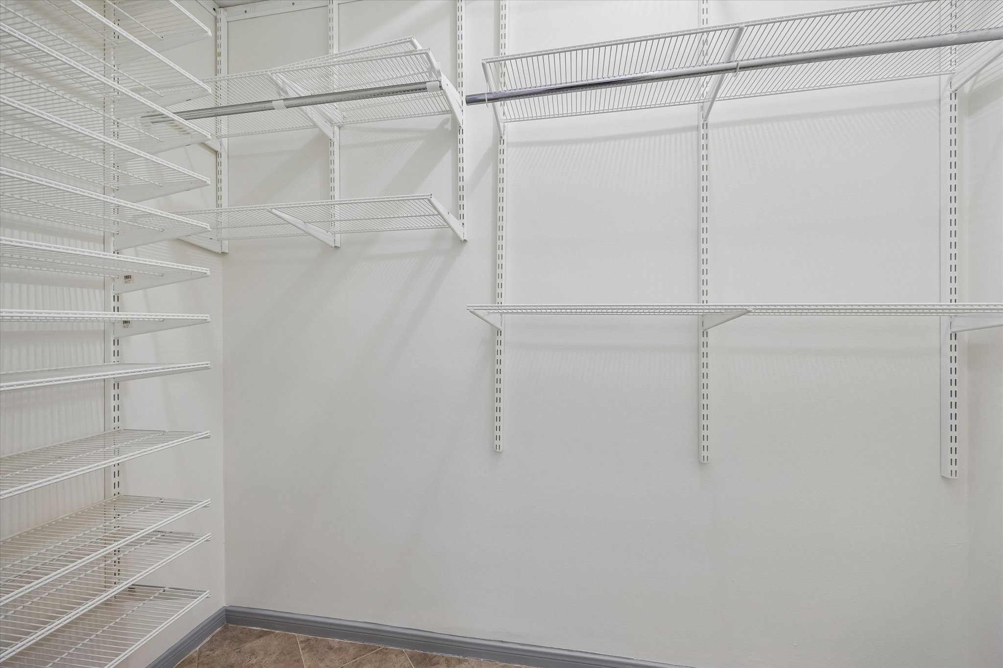 727 Bunker Hill Road, Unit 92 Houston, TX 77024 - Photo 20 of 50 SECOND CLOSET IN PRIMARY BEDROOM OFFERS SHELVING GALORE.