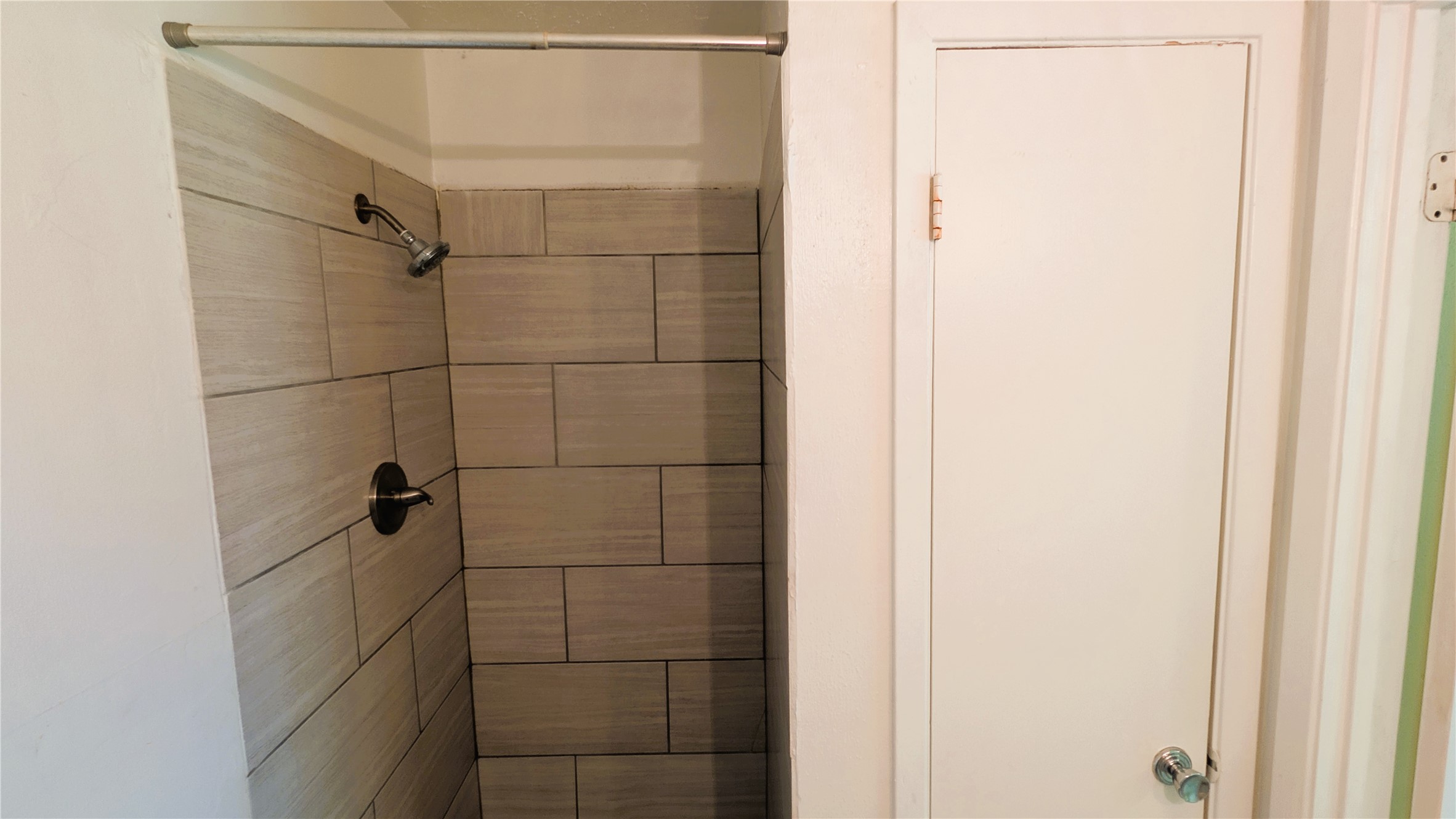 11403 Spring Grove Drive Houston, TX 77099 - Photo 12 of 23 a bathroom with a shower