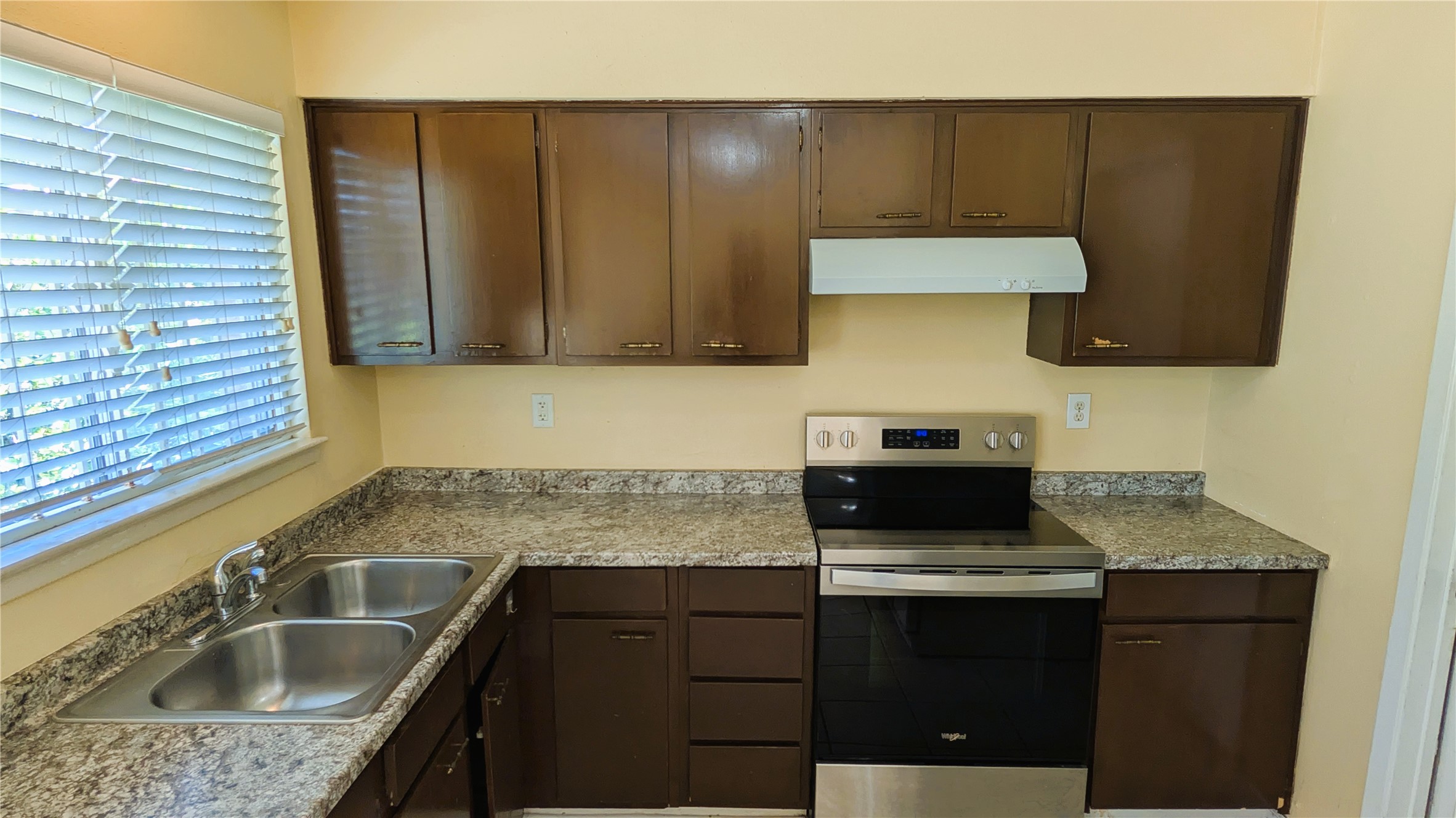 11403 Spring Grove Drive Houston, TX 77099 - Photo 8 of 23 a kitchen with a sink and cabinets